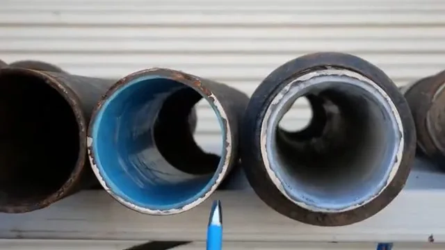 Lined steel pipe sections laid out on the ground